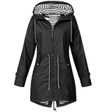 Lang vanntett dameparka med hette og justerbar midje