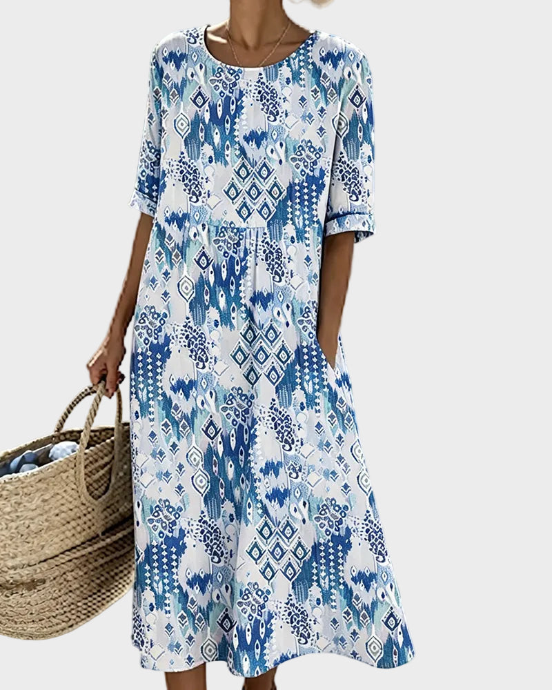 Emma – Ledig og lett blomstret midikjole