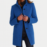 Elegant damekåpe med ståkrage og knapper