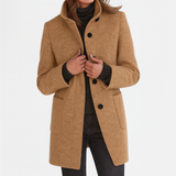 Elegant damekåpe med ståkrage og knapper