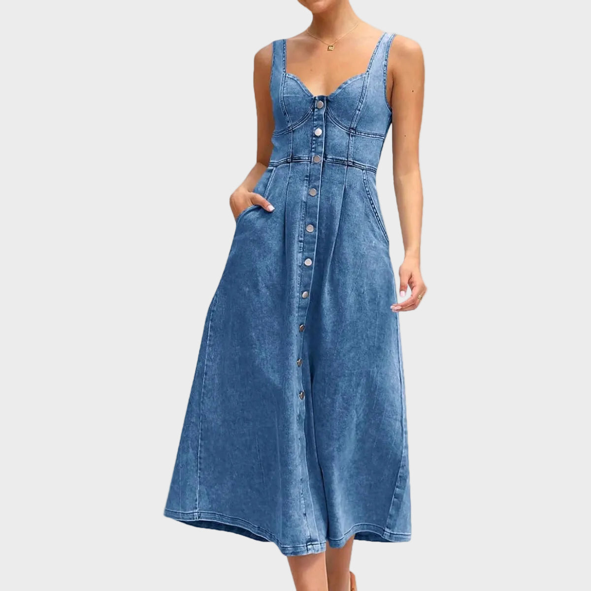 Aneta – Ermeløs denimkjole med knapper foran
