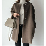 Elegant lang oversize-kåpe for dame