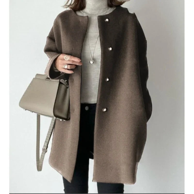 Elegant lang oversize-kåpe for dame