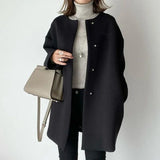 Elegant lang oversize-kåpe for dame