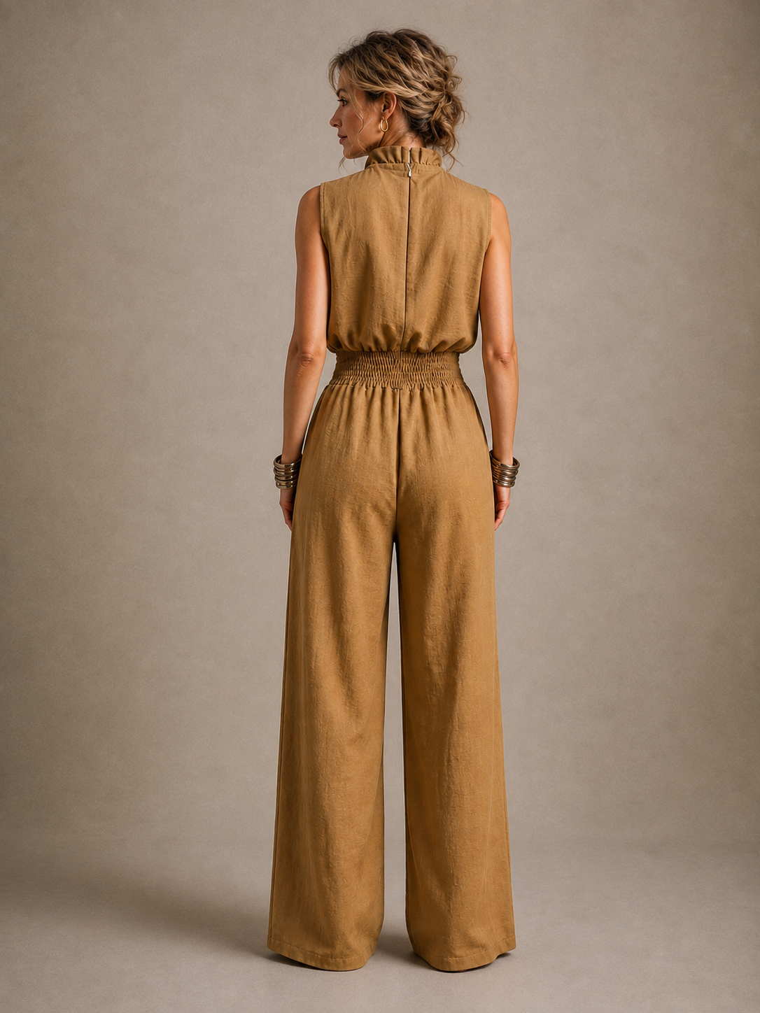 Celia | Ermeløs jumpsuit med knyting
