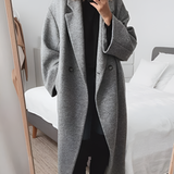 Elegant oversize damekåpe med dobbeltspent lukking