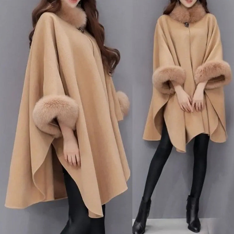 Elegant cape for dame med ståkrage og vide ermer